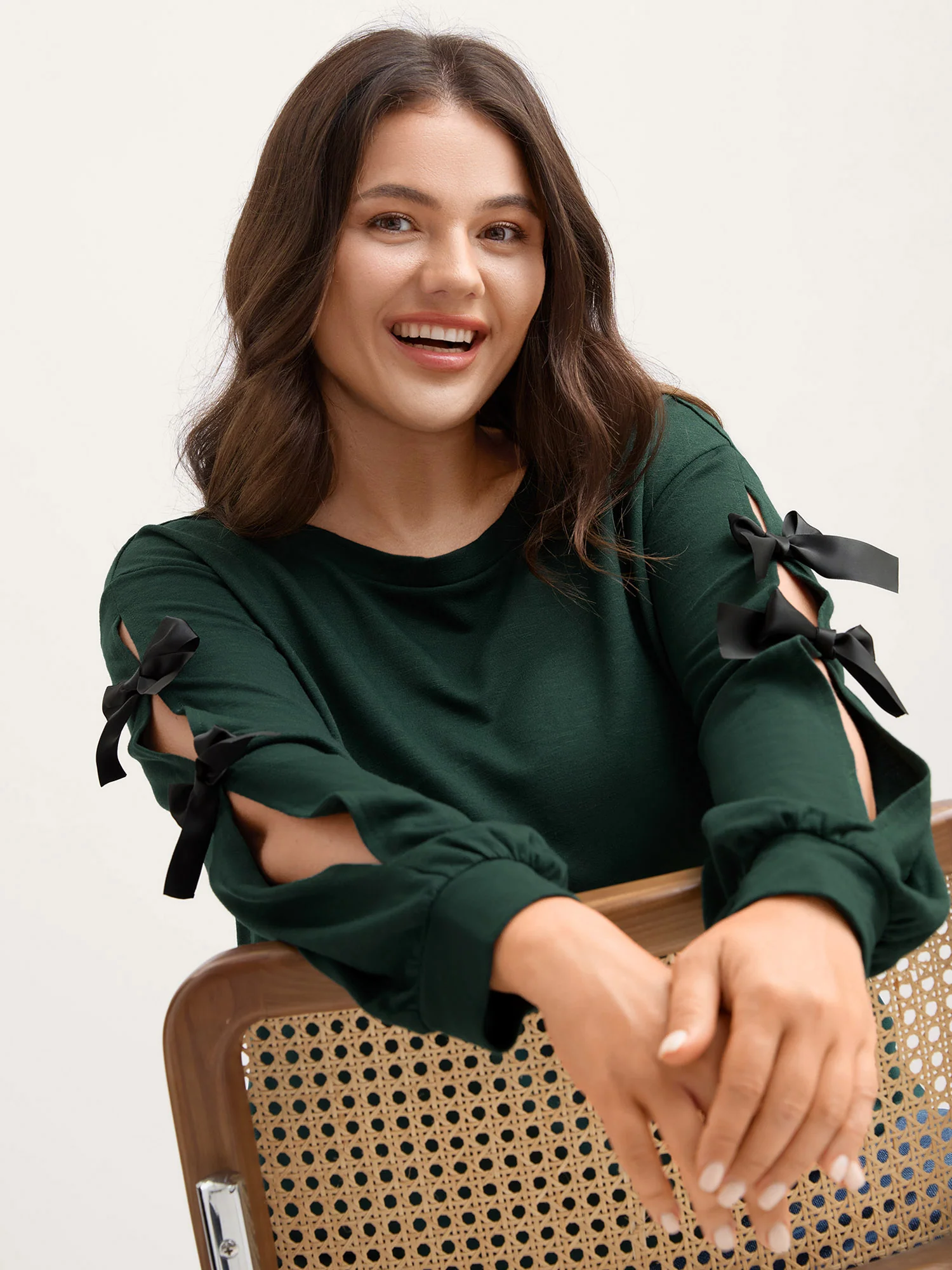 Bow-Knot Sleeve Cut-Out Sweatshirt